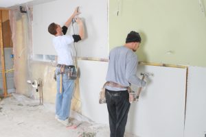 Drywall repair workers